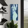 Minimalist female nude in cool tones, modern art on a blue background