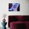Painting visualized in a living room, above a burgundy sofa. A vase stands nearby