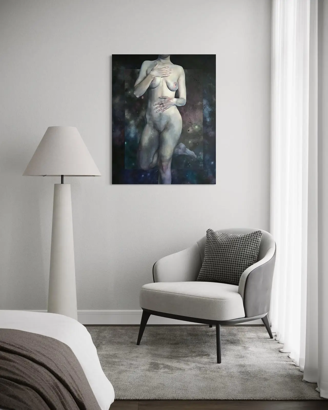 Modern female nude canvas painting hanging in a minimalist bedroom with a light armchair and neutral interior design