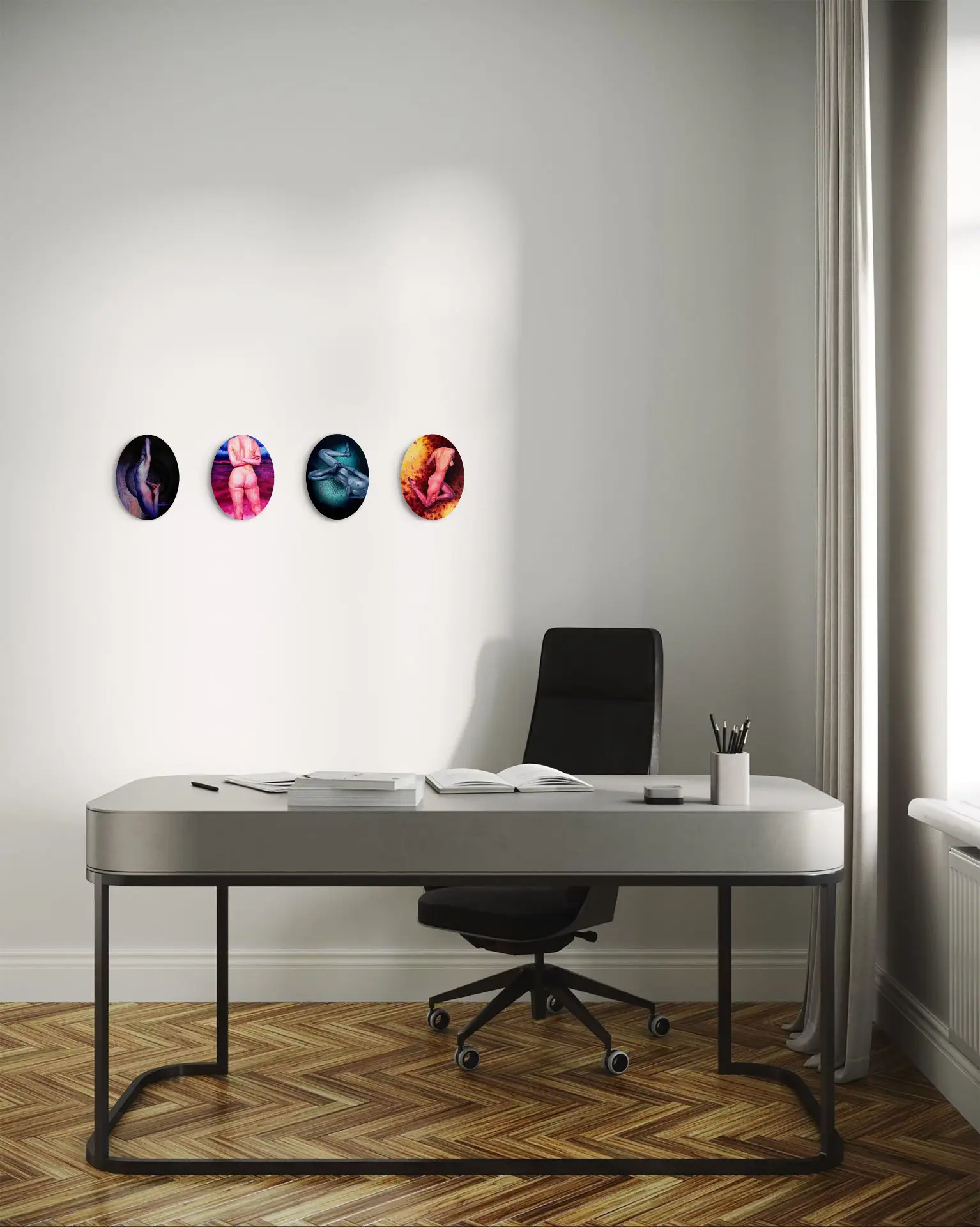 Four oval paintings of artistic nudes in various colors, hanging on the wall of a modern office
