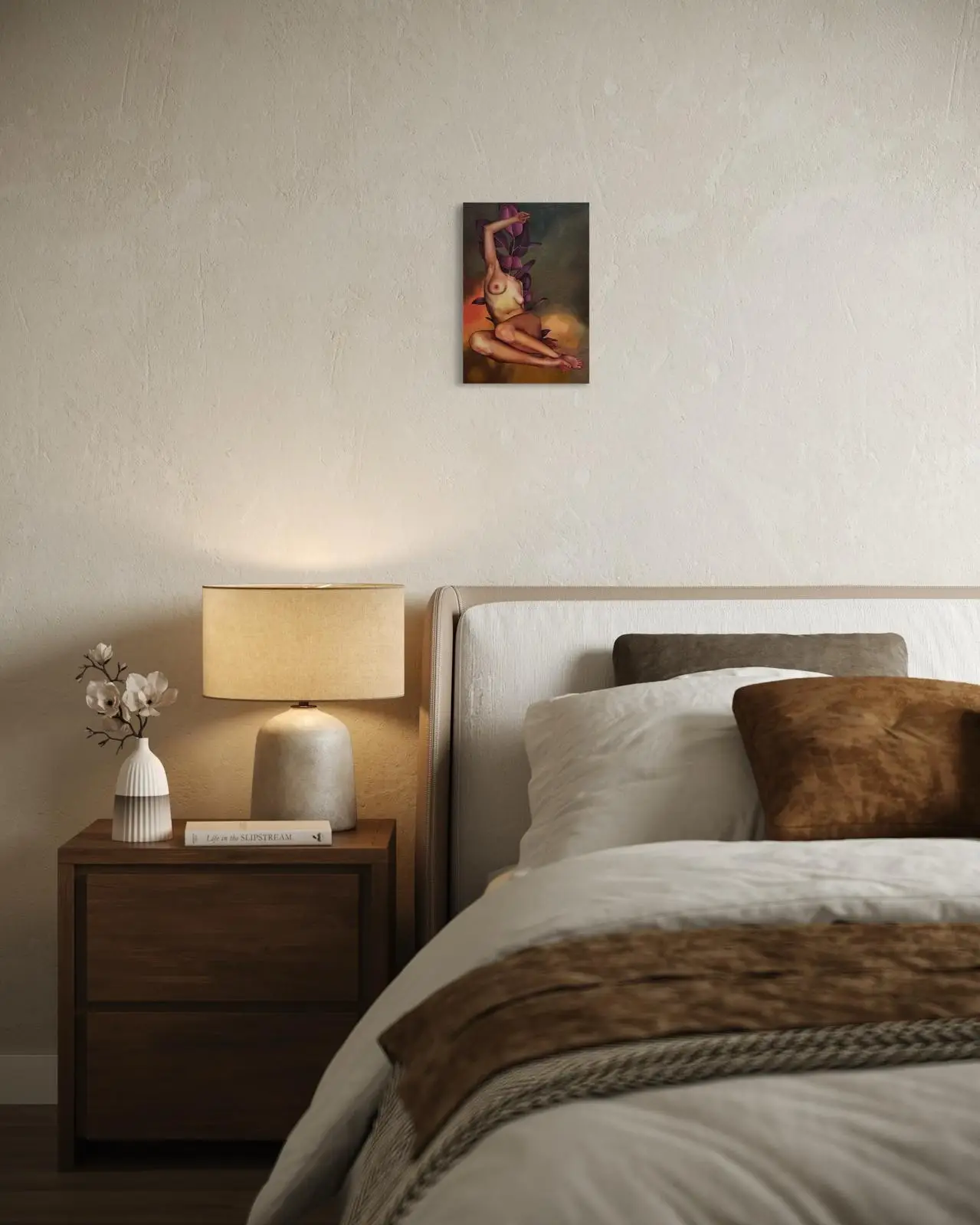 Bedroom in natural tones with a painting depicting a female nude with botanical elements above a bedside table with a lamp and vase
