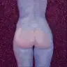 Jagoda Laprus. Oil painting 20x20cm. Purple female nude body standing from behind on a shimmering glitter background