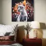 Painting of a Sphynx cat with orange ears and red eyes above a bedside table in a bedroom