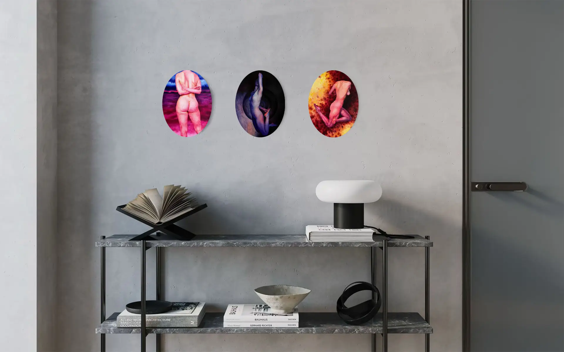 Modern interior with three oval paintings of nudes on a concrete wall