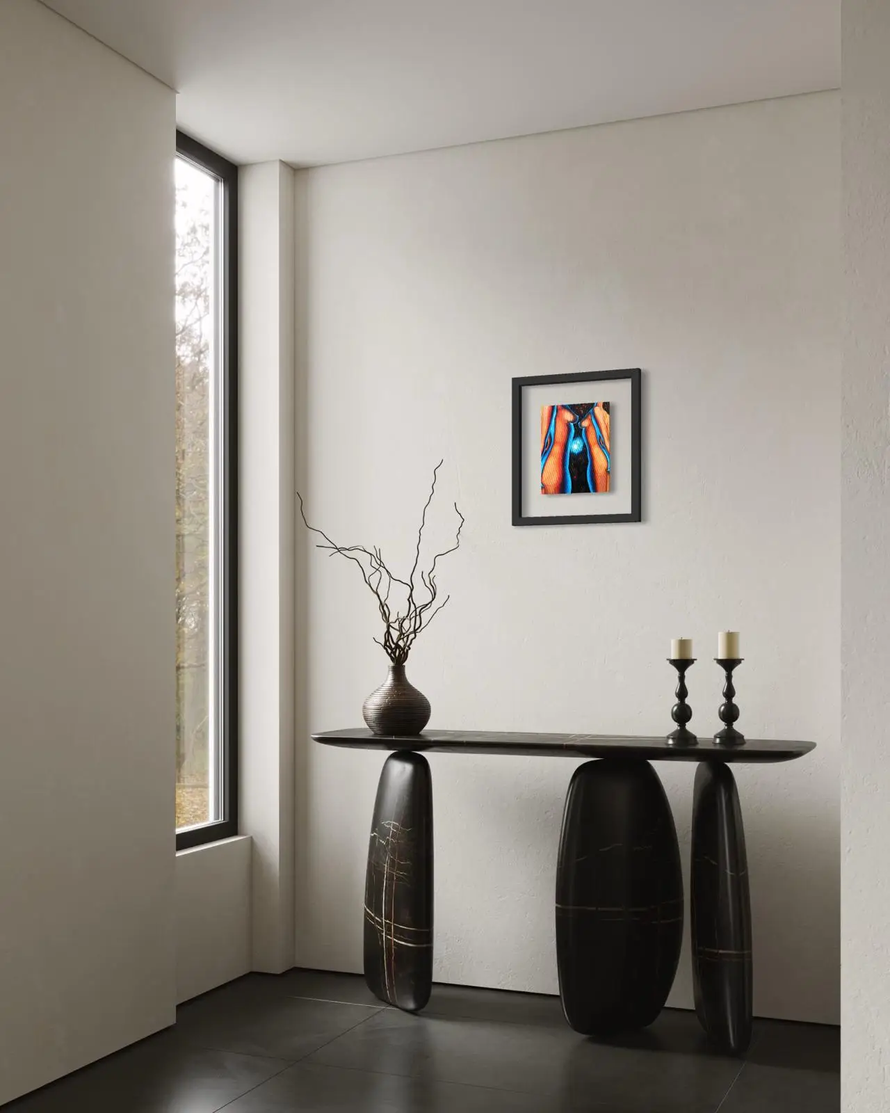 Modern interior with a black console and an abstract-style oil painting on the wall
