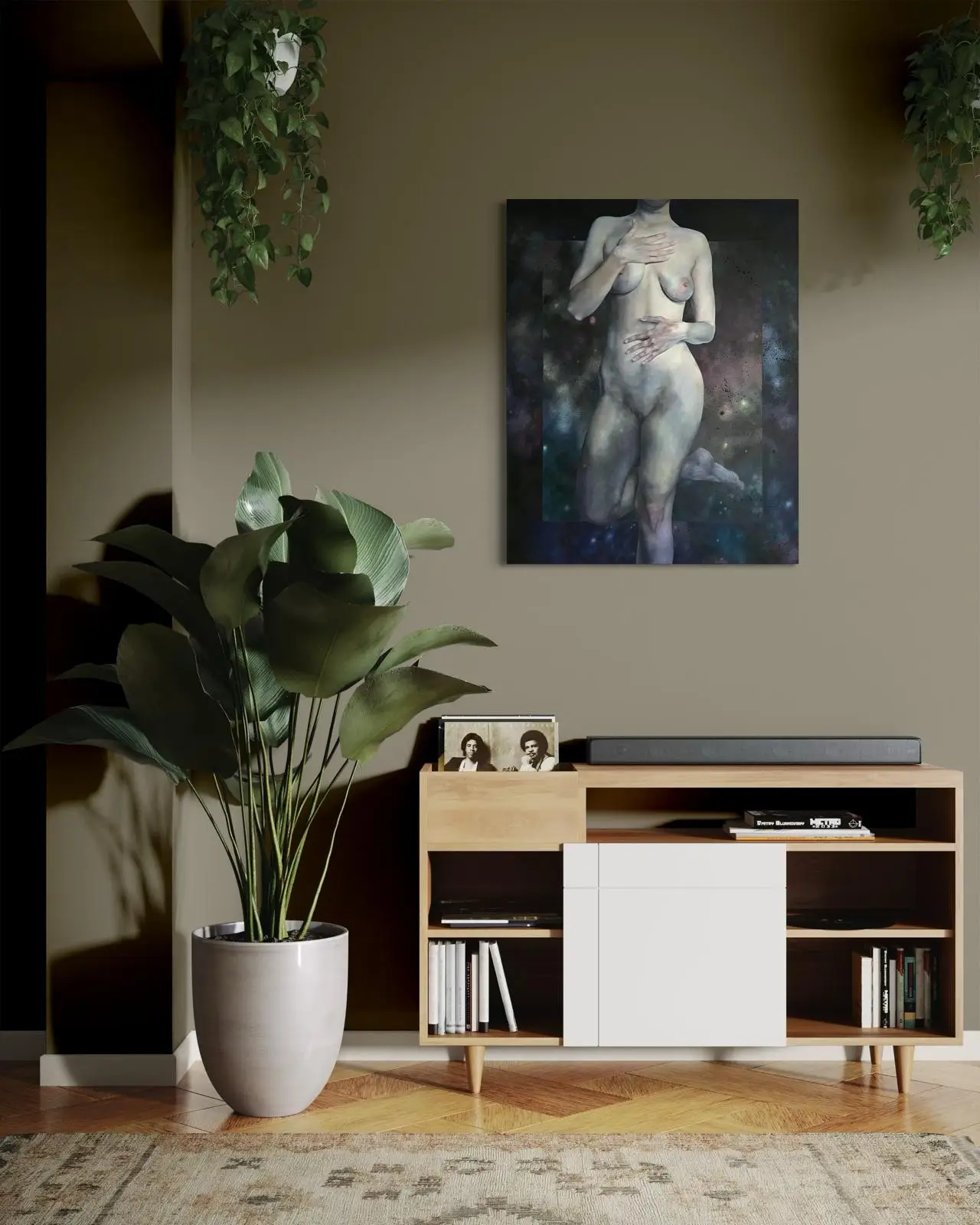 Contemporary female nude painting on the wall in a living room with a wooden sideboard and green plant, elegant interior decoration