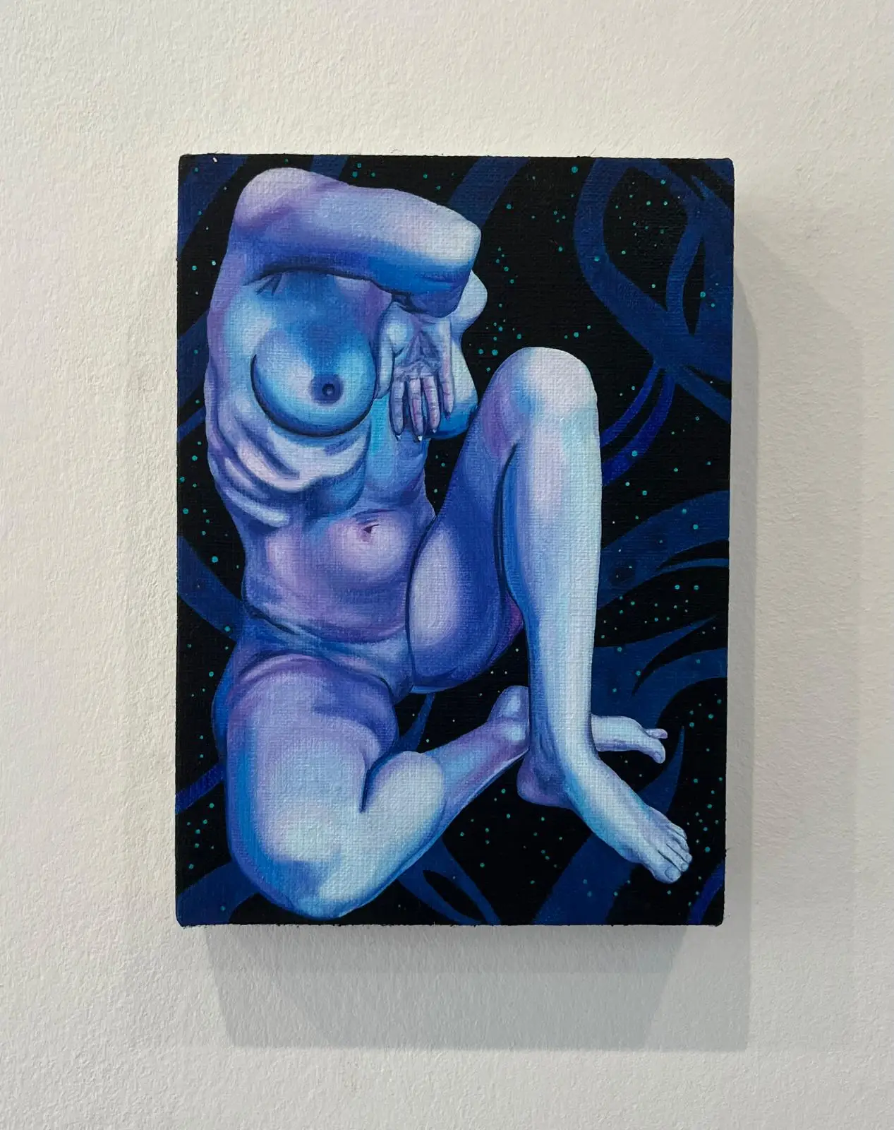 Painting with a blue female nude in a dynamic pose on a dark background with blue and purple accents